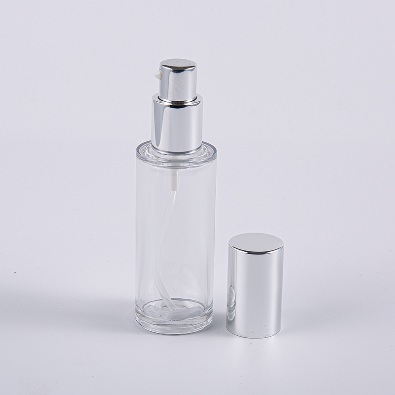 Flacone per lozione rotondo da 35 ml di alta qualità con pompa in alluminio per uso in viaggio Flacone per lozione rotondo da 35 ml di alta qualità con pompa in alluminio per uso in viaggio