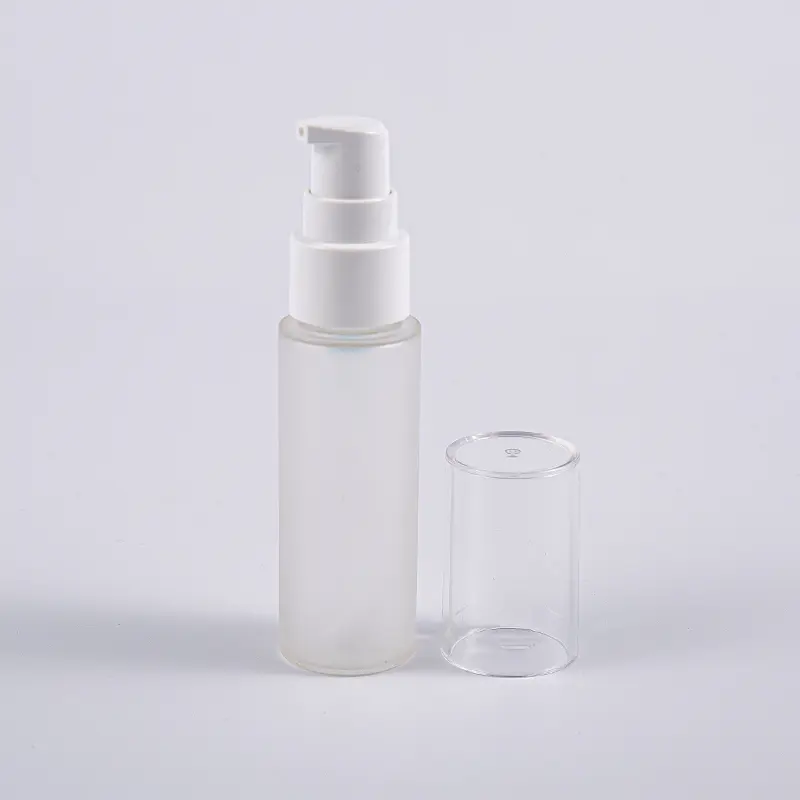 Flacone per lozione PETG da 30 ml di forma rotonda di vari colori con uso in viaggio della pompa Flacone per lozione PETG da 30 ml di forma rotonda di vari colori con uso in viaggio della pompa