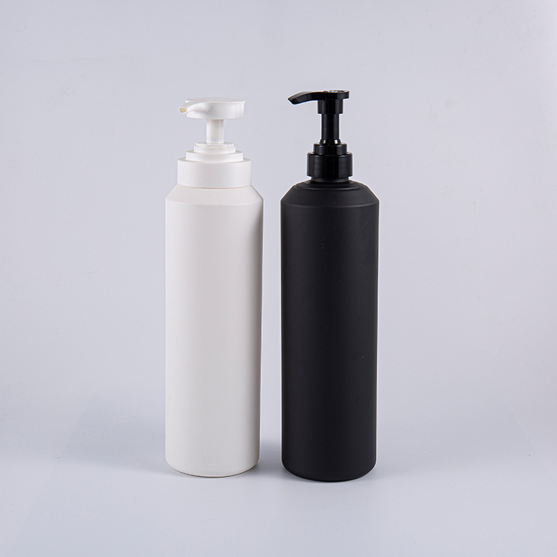 Flacone con pompa detergente in PE rotondo di grandi dimensioni da 1000 ml, bianco e nero, morbido al tatto