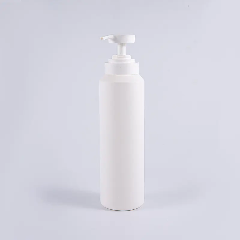 Flacone con pompa detergente in PE rotondo di grandi dimensioni da 1000 ml, bianco e nero, morbido al tatto